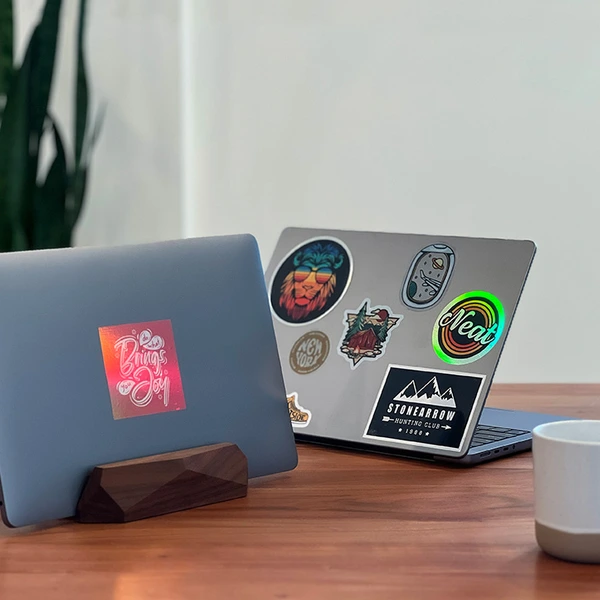 laptops with stickers on them